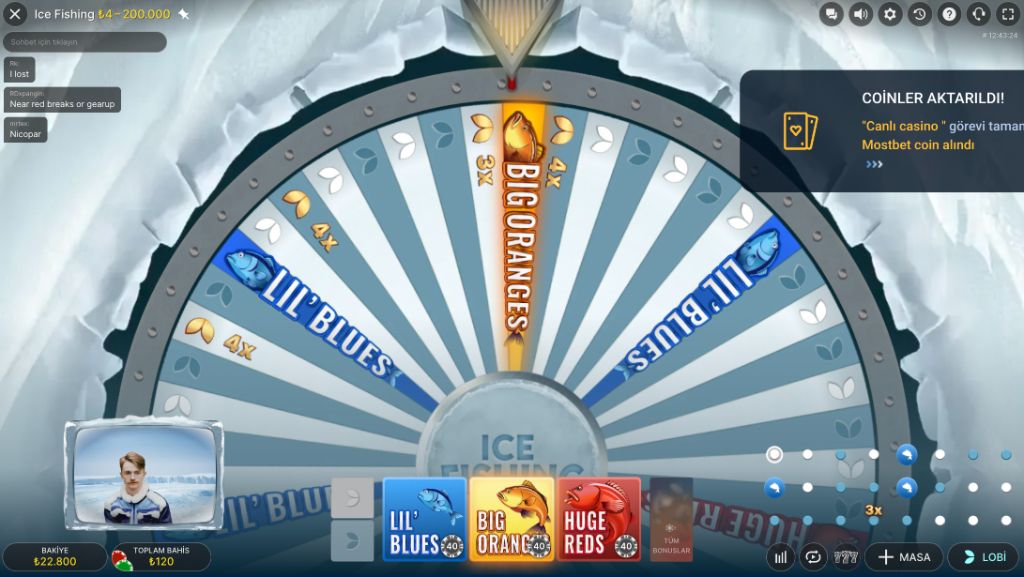 Ice Fishing wheel pointer landing on the Big Oranges bonus segment
